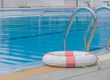 pool with life ring pictured to represent drowning accidents