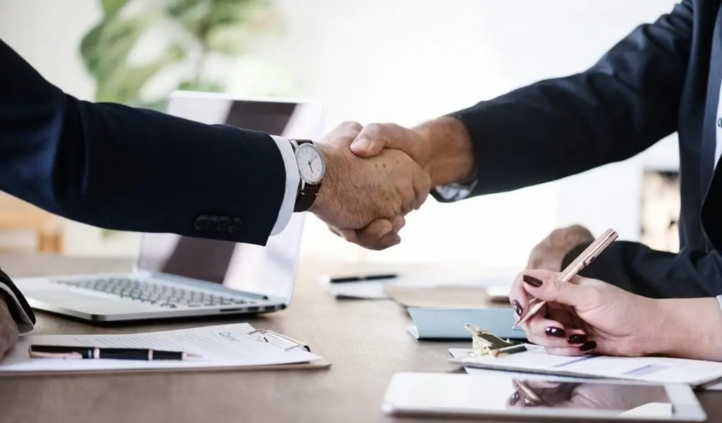 Handshake to complete injury case settlement