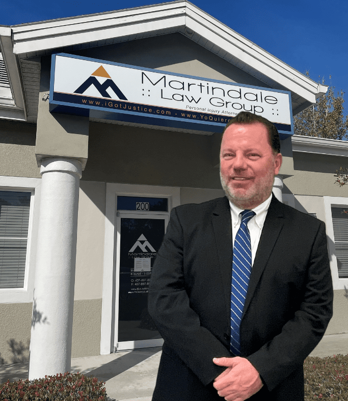 Attorney Rick Martindale standing in front of his Law Office in Orlando