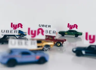 hotwheel cars with varying uber and lyft rideshare signs